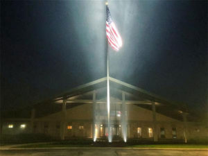 Valley Brook Country Club in Canonsburg, PA with night led lights shining up at flag for Memorial Day