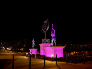 Sculpture outside in Ashland, Kentucky with purple led lights