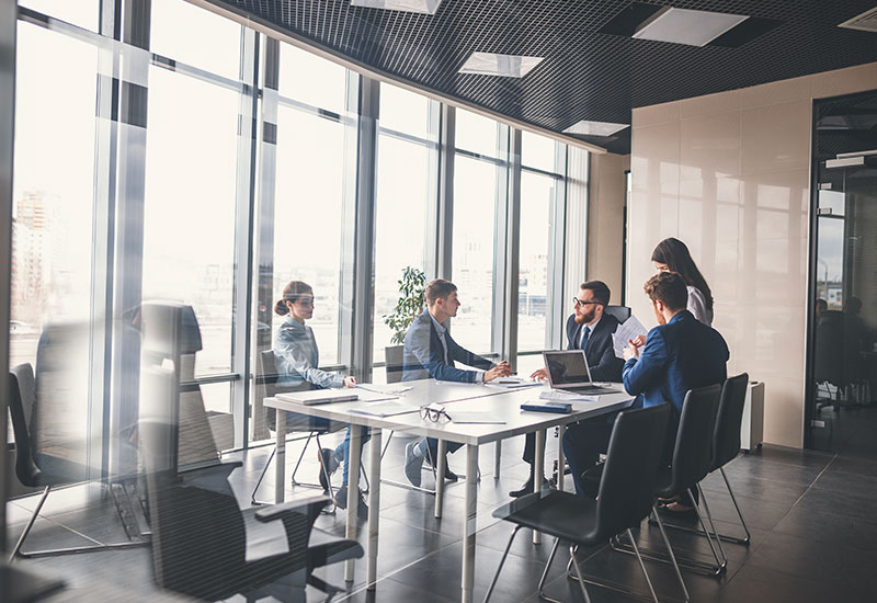 Laface and McGovern leadership team in conference room at PA office